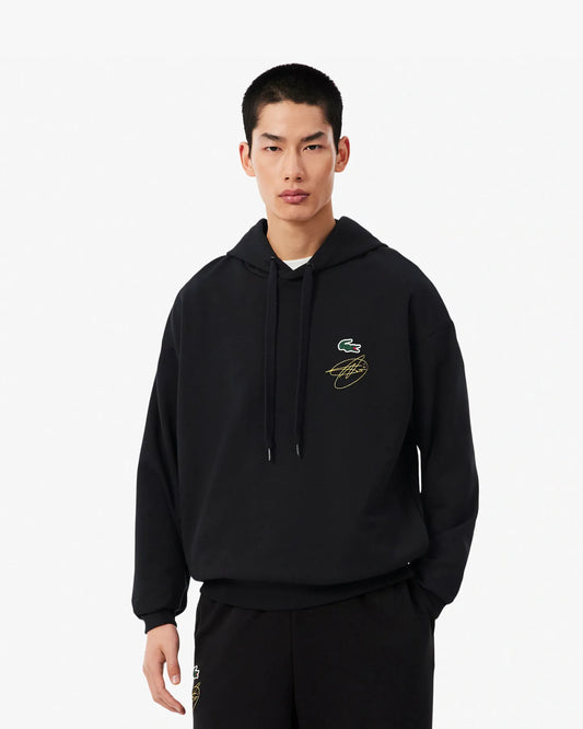 moletom preto com capuz Lacoste x Novak Djokovic, edição cápsula para fãs, com assinatura bordada